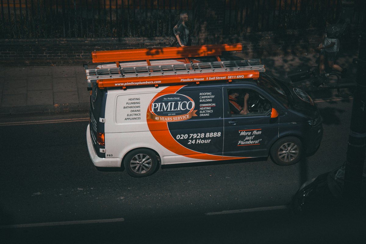 Work van with company lettering and logo